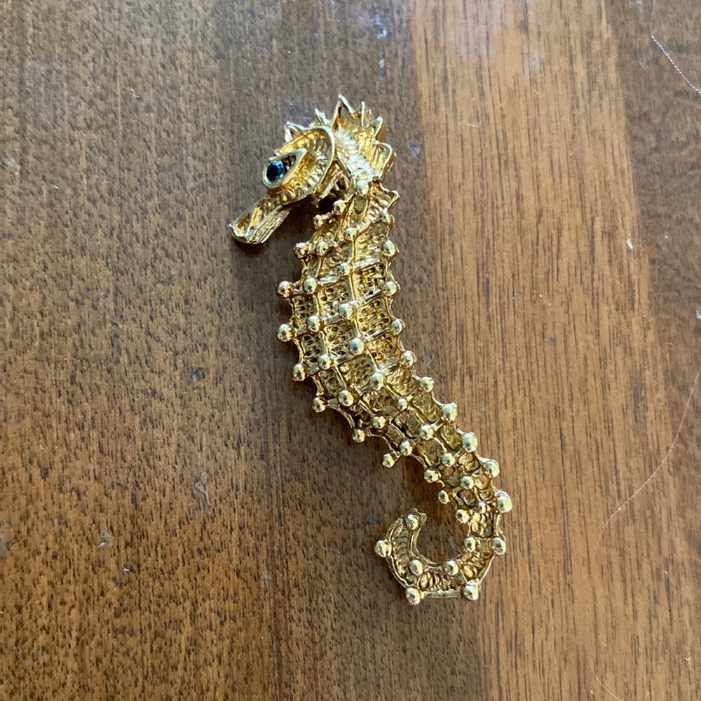 Gold seahorse brooch